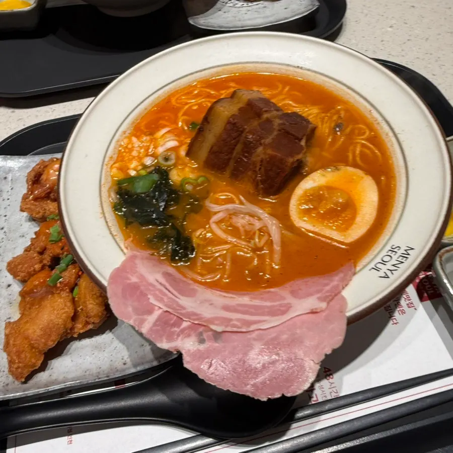 A generous full spread of Menya Seoul's dongpo pork ramen