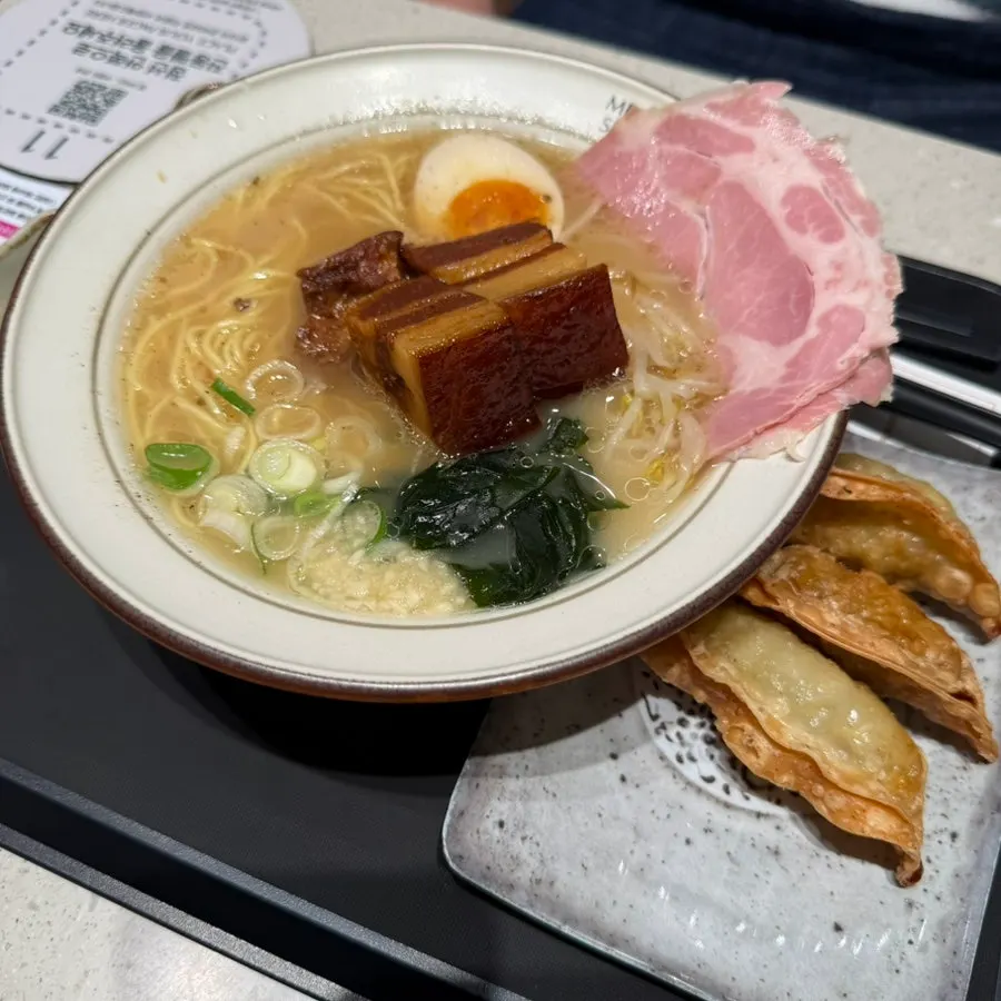Dongpo pork ramen topped with bean sprouts and ajitama