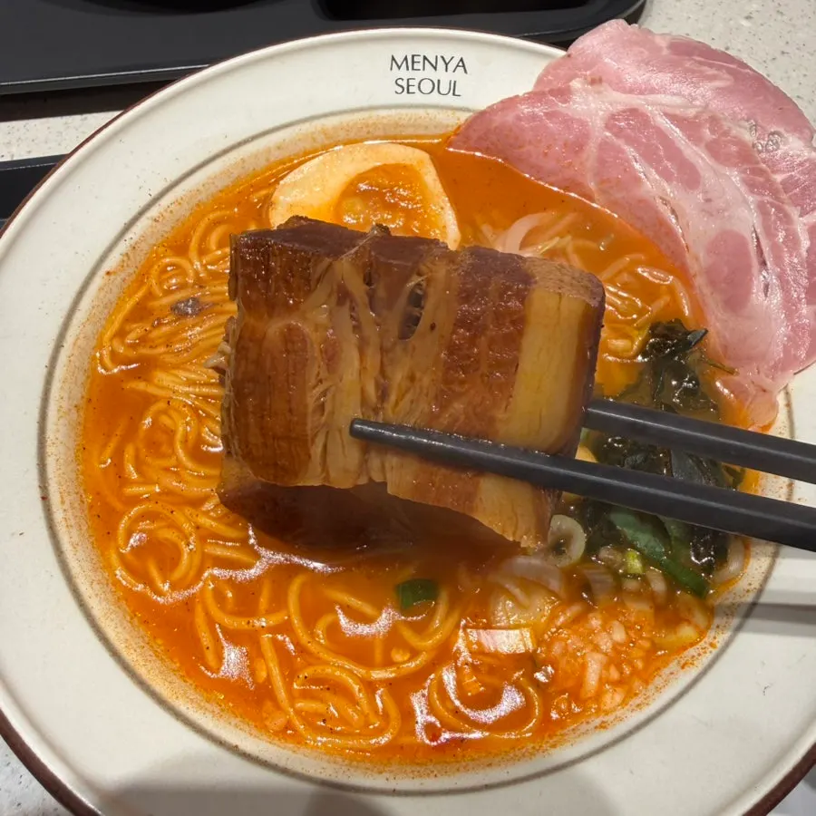 Cross-section of dongpo pork showing softly cooked fat layer