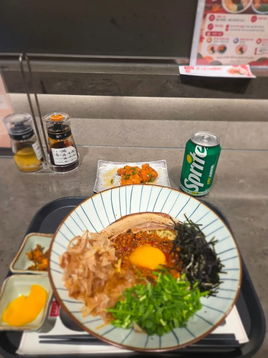 Menya Seoul mazesoba topped with egg yolk and meat sauce