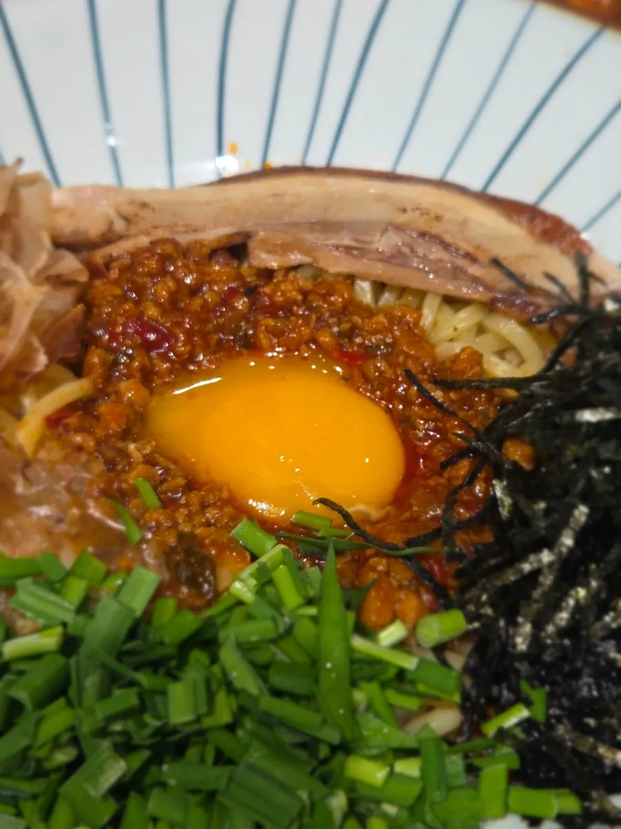 Mazesoba mixed together after breaking the yolk