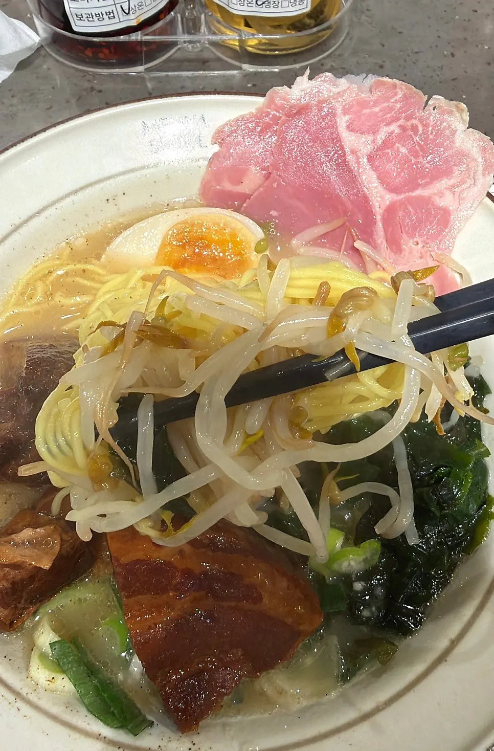 Close-up of ramen fully covered in dongpo pork