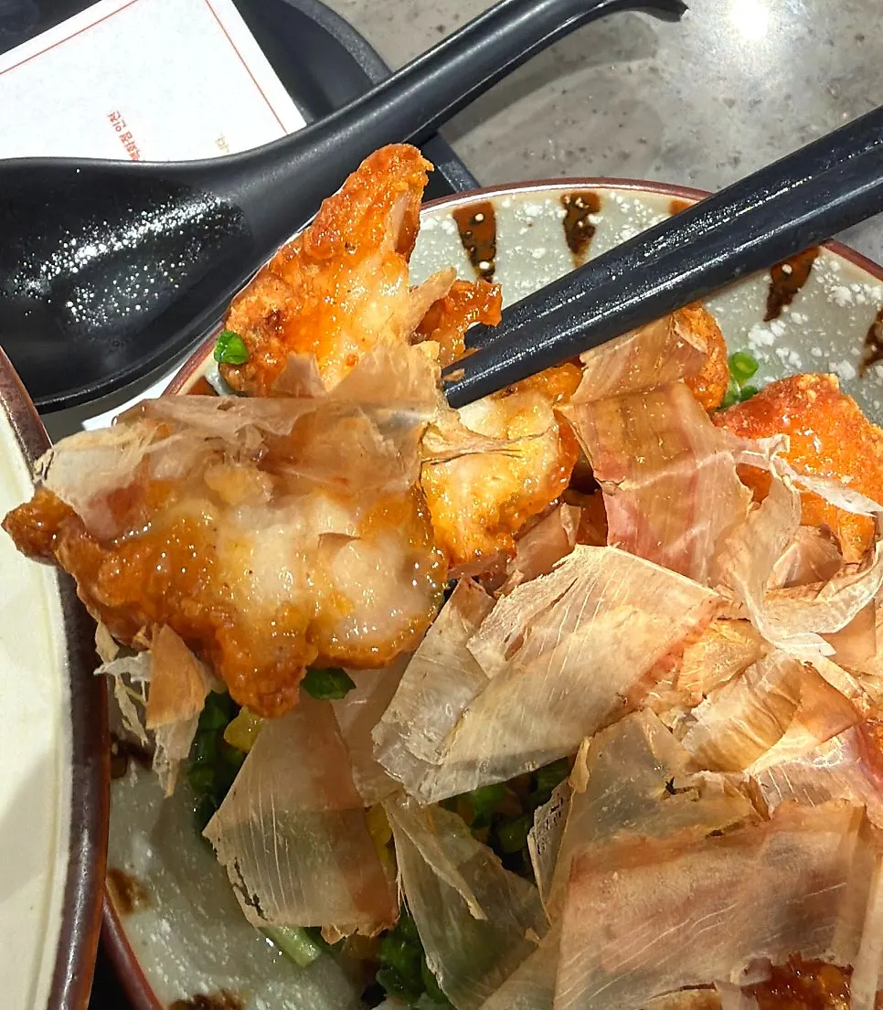 Sweet soy chicken rice bowl topped with bonito flakes
