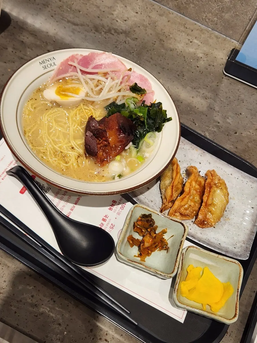 Mild broth dongpo pork ramen with soft-boiled egg and bean sprouts