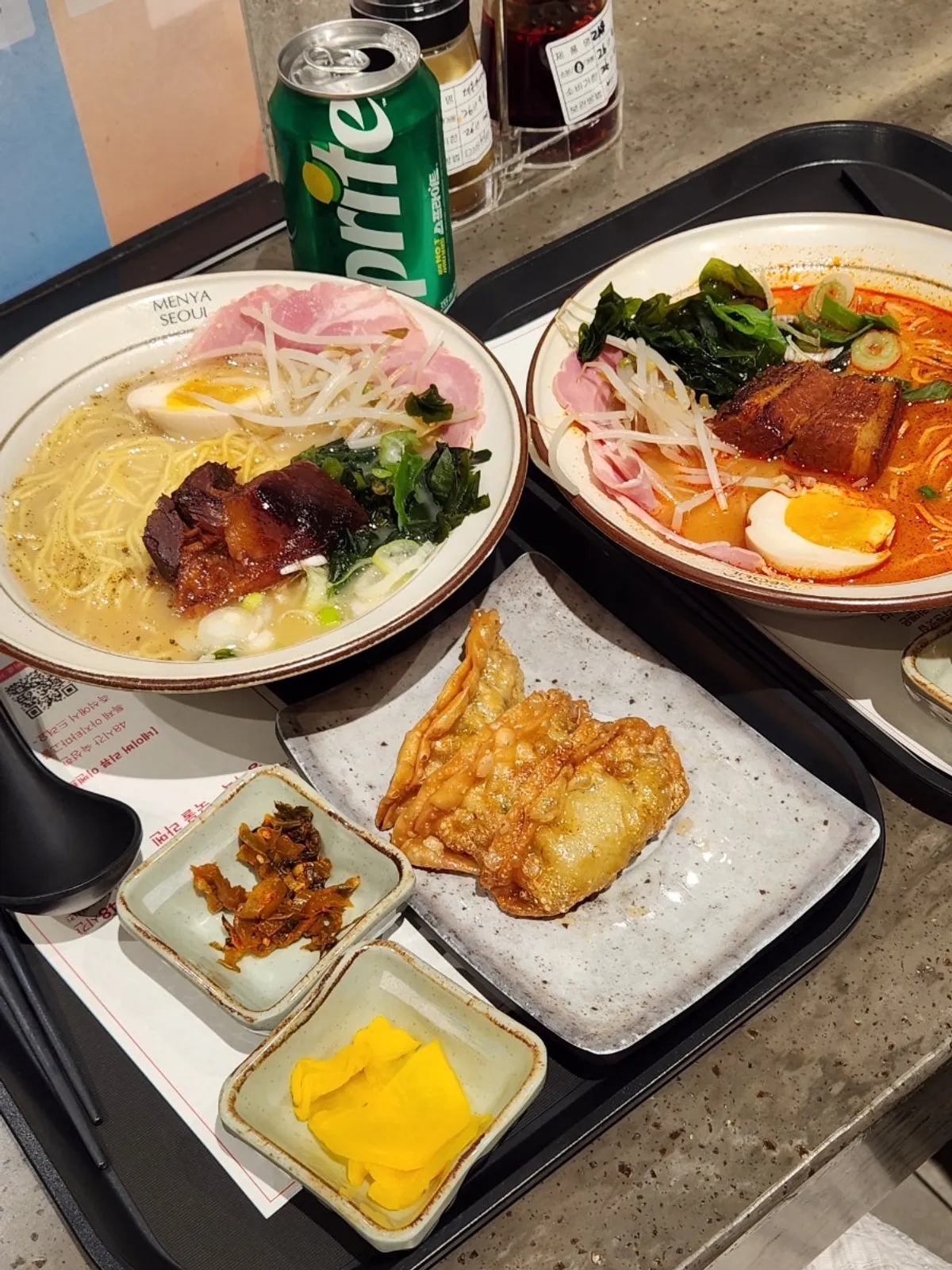 Dongpo pork ramen and crispy gyoza set laid out together