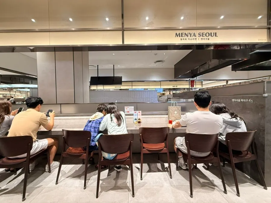 Open kitchen at Menya Seoul where the cooking process is visible