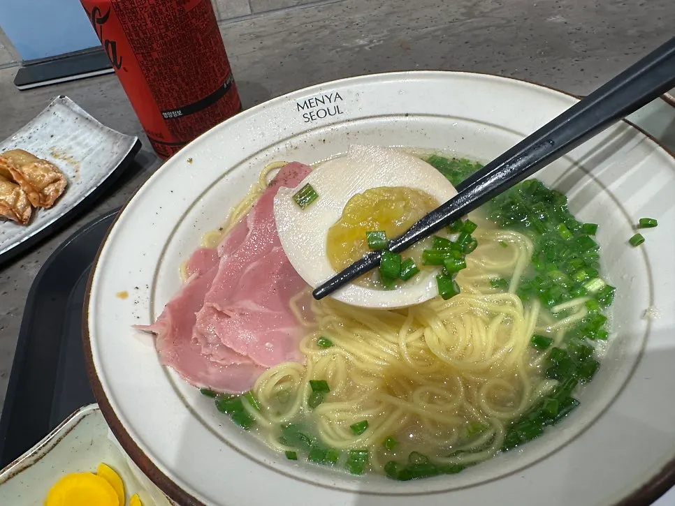 Ramen topped with a halved soft-boiled egg