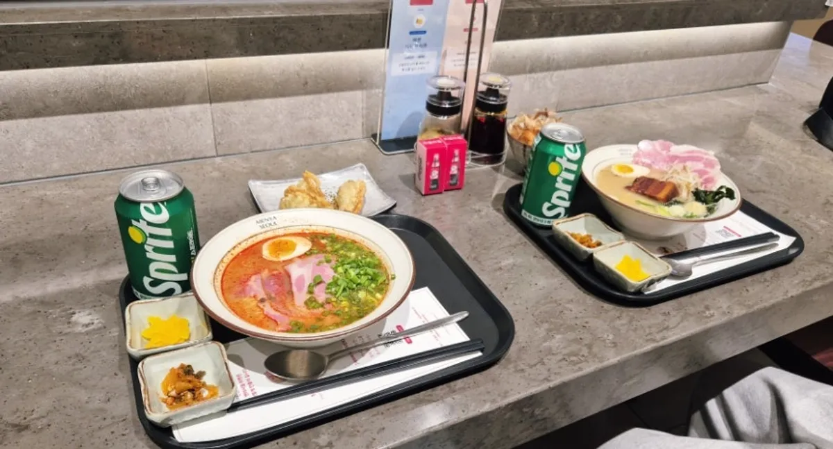 Dongpo pork ramen and jambon ramen bowls placed side by side