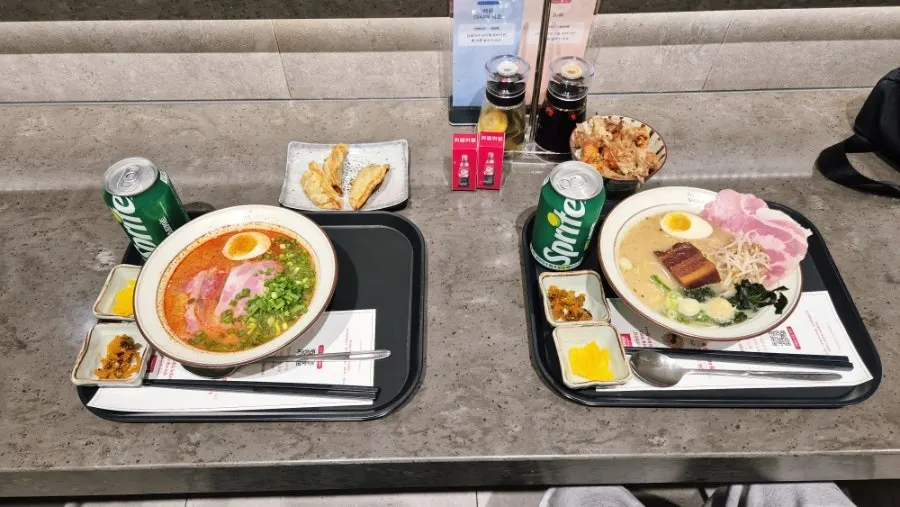 Full spread of ramen and sides from the set order