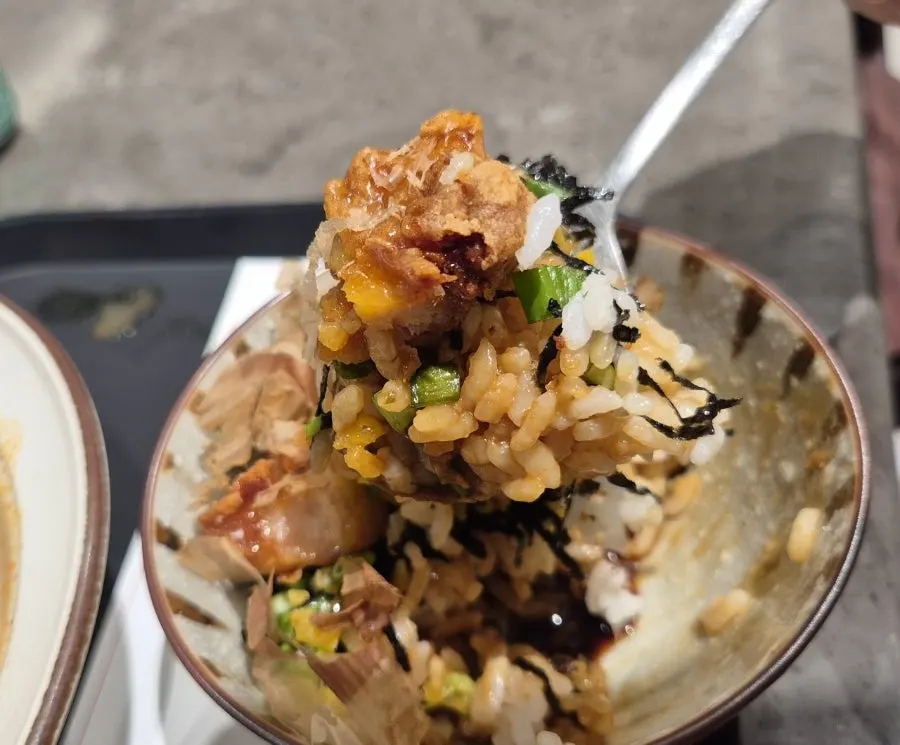 Ramen bowl mid-meal