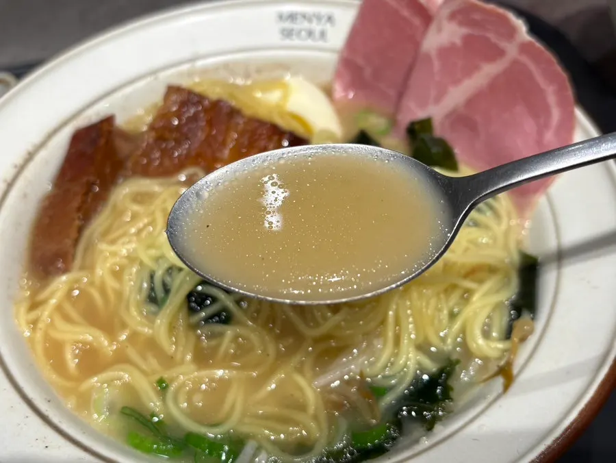 Bean sprout, seaweed, and green onion toppings on the mild broth ramen
