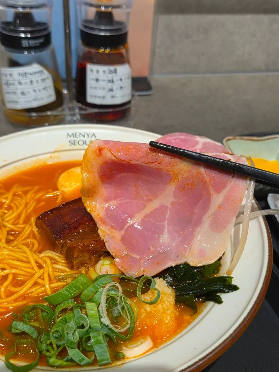 Spicy chashu ramen topped with dongpo pork