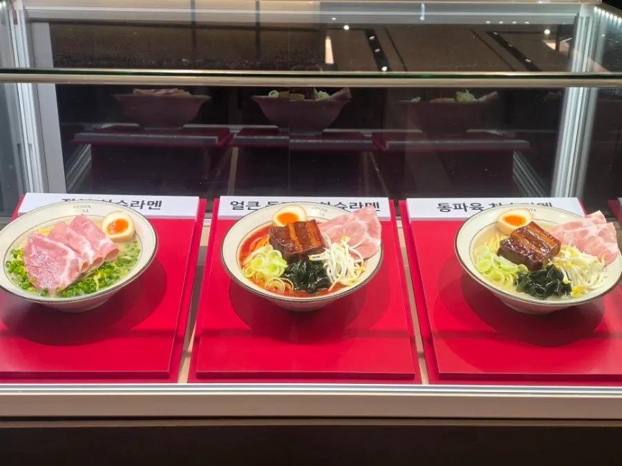 Display of realistic, full-size menu models in front of Menya Seoul