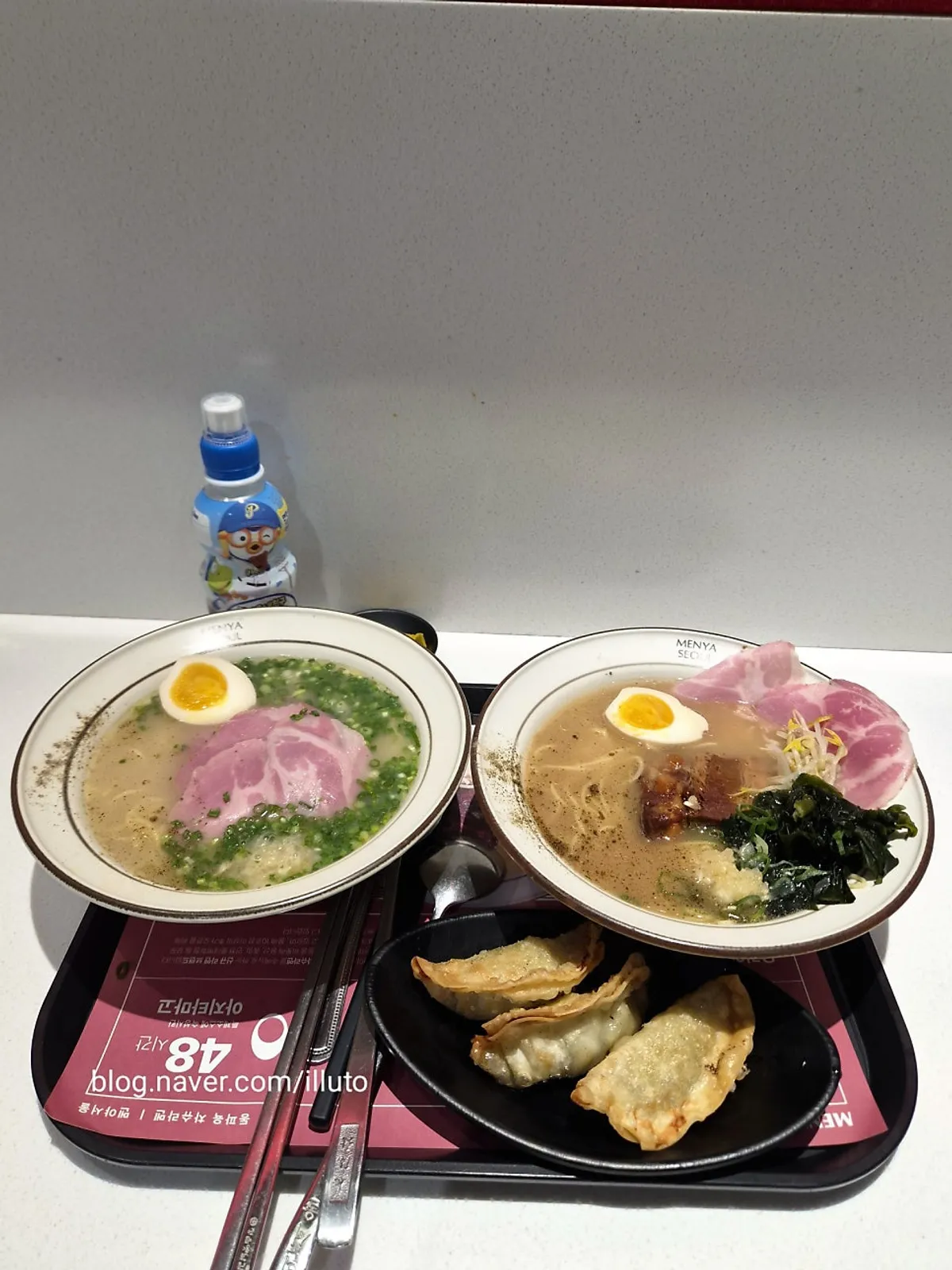 The table set with a solo ramen and a set menu