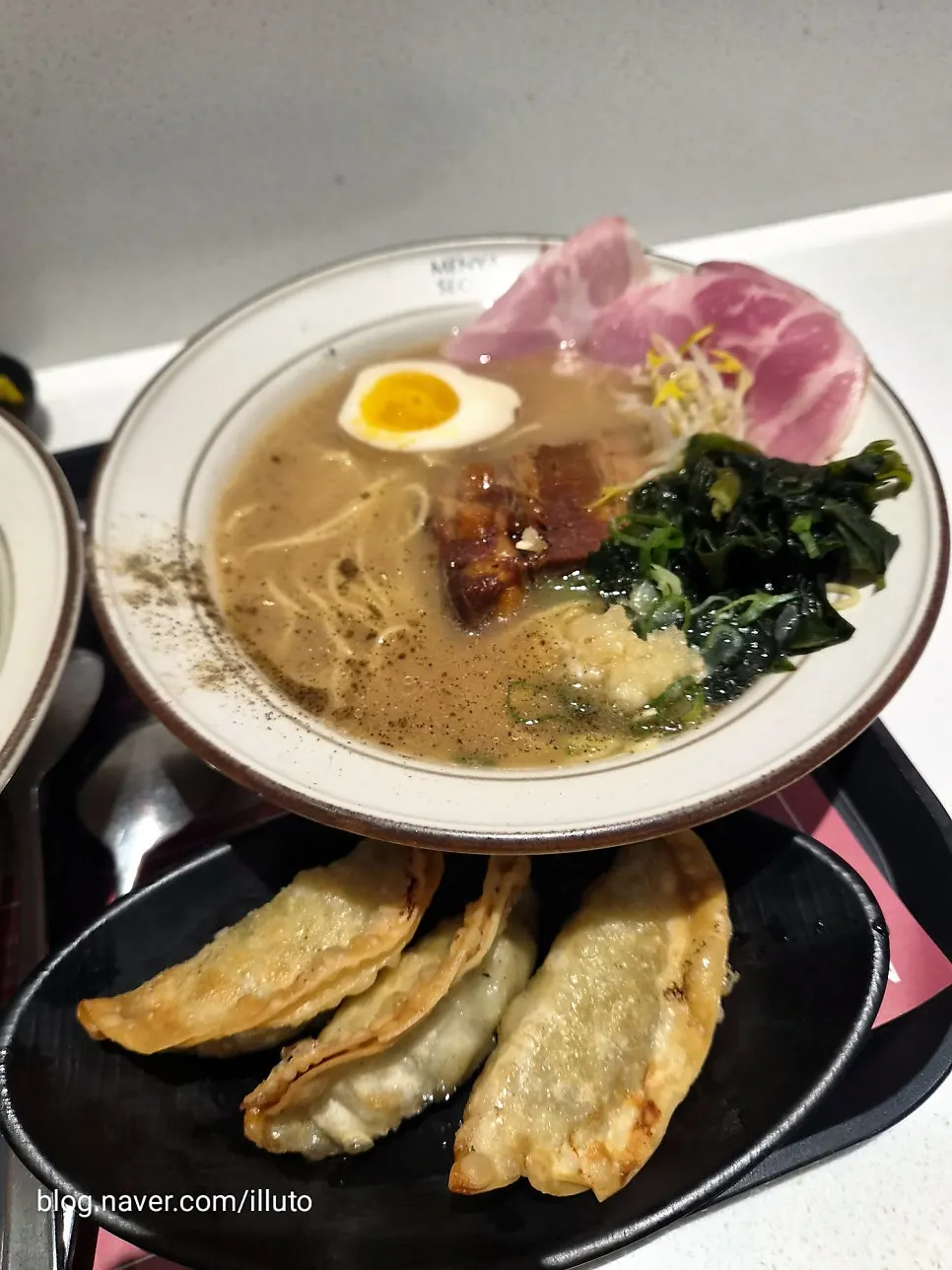 Dongpo pork chashu ramen topped with dongpo pork and jamón
