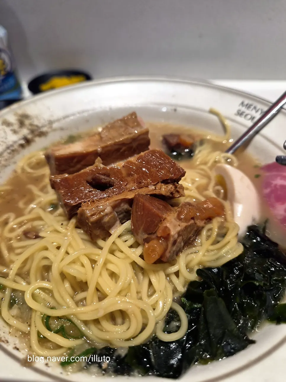 Thin noodles soaked in the rich broth