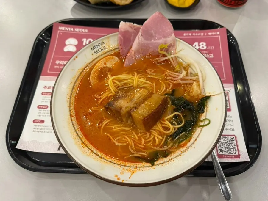 Close-up of the tonkotsu-based dongpo pork chashu ramen broth