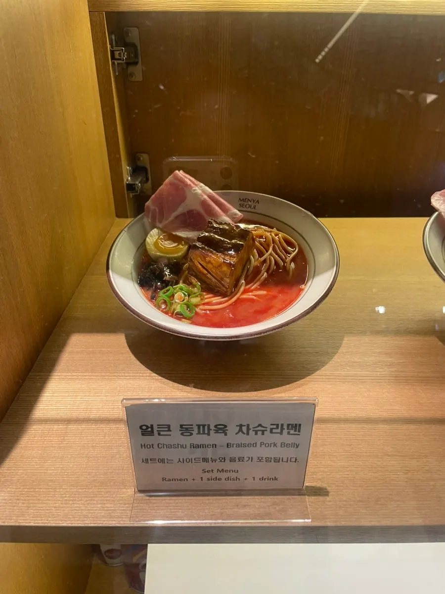 Numbered menu board for ramen at Menya Seoul