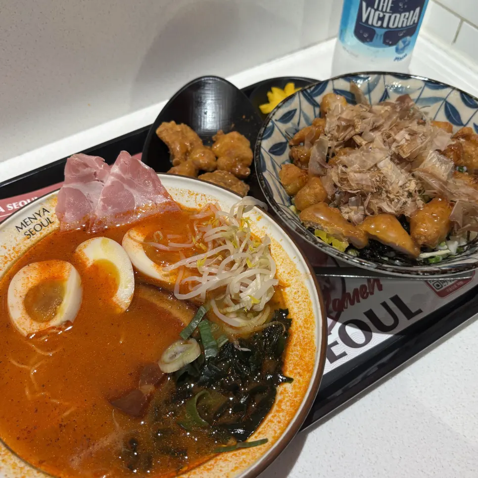 The ordered spicy broth dongpo pork ramen set laid out on the table