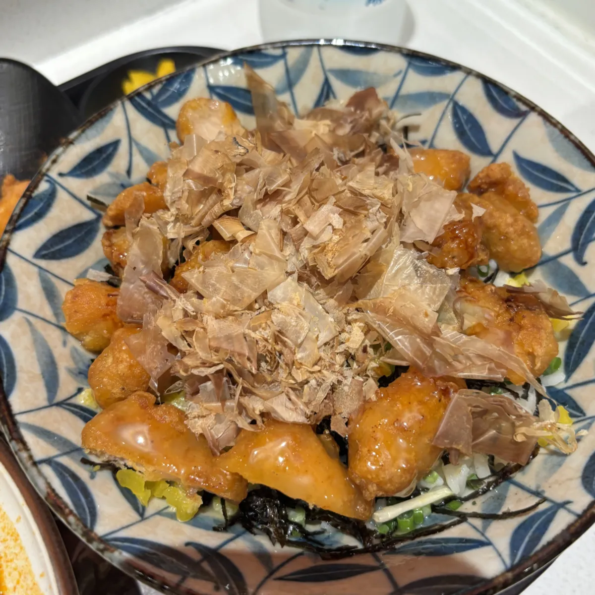 The sweet soy chicken rice bowl served as the set side