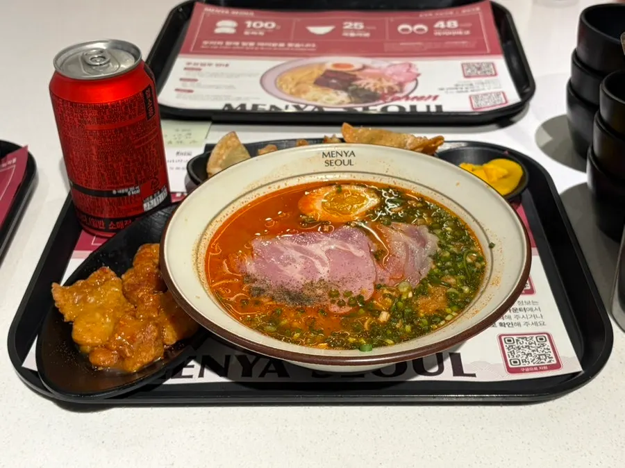 Ordered set menu and extra side laid out on the table