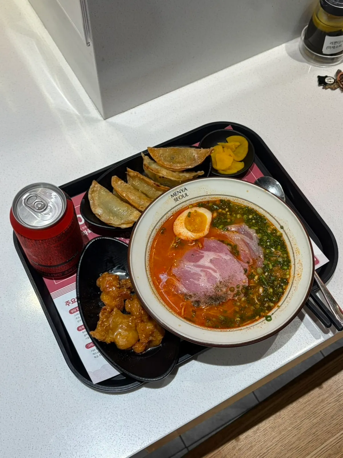 Spicy jambon ramen set with side dish spread