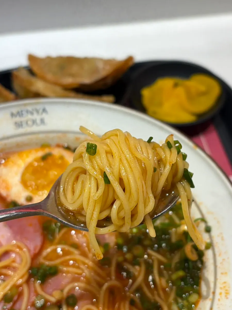 Spicy ramen broth with added rayu