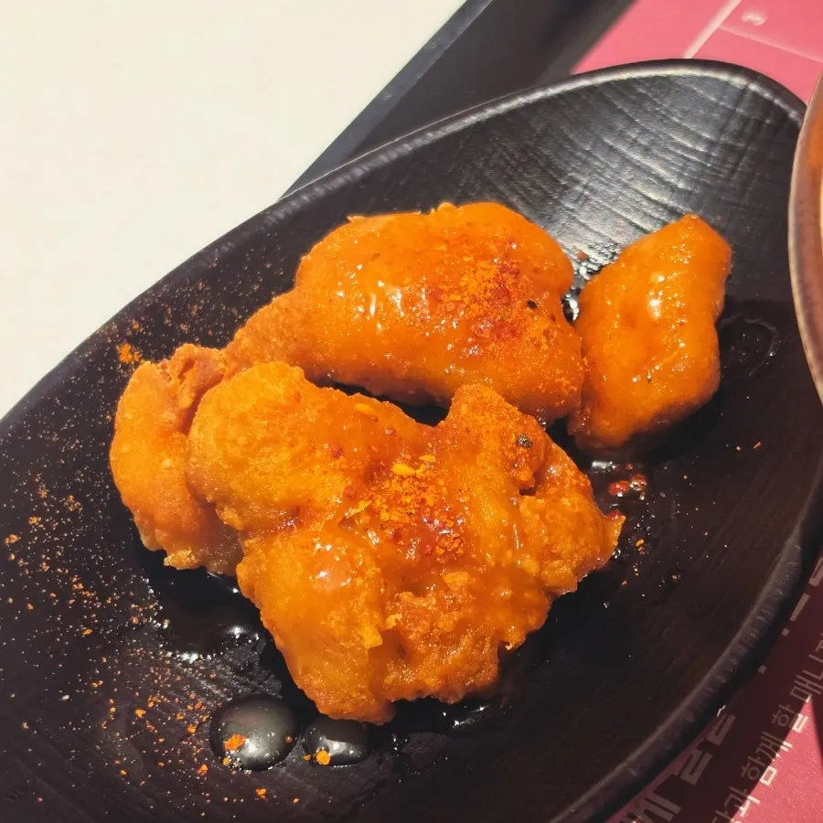 Gyoza dumplings and karaage ordered as sides