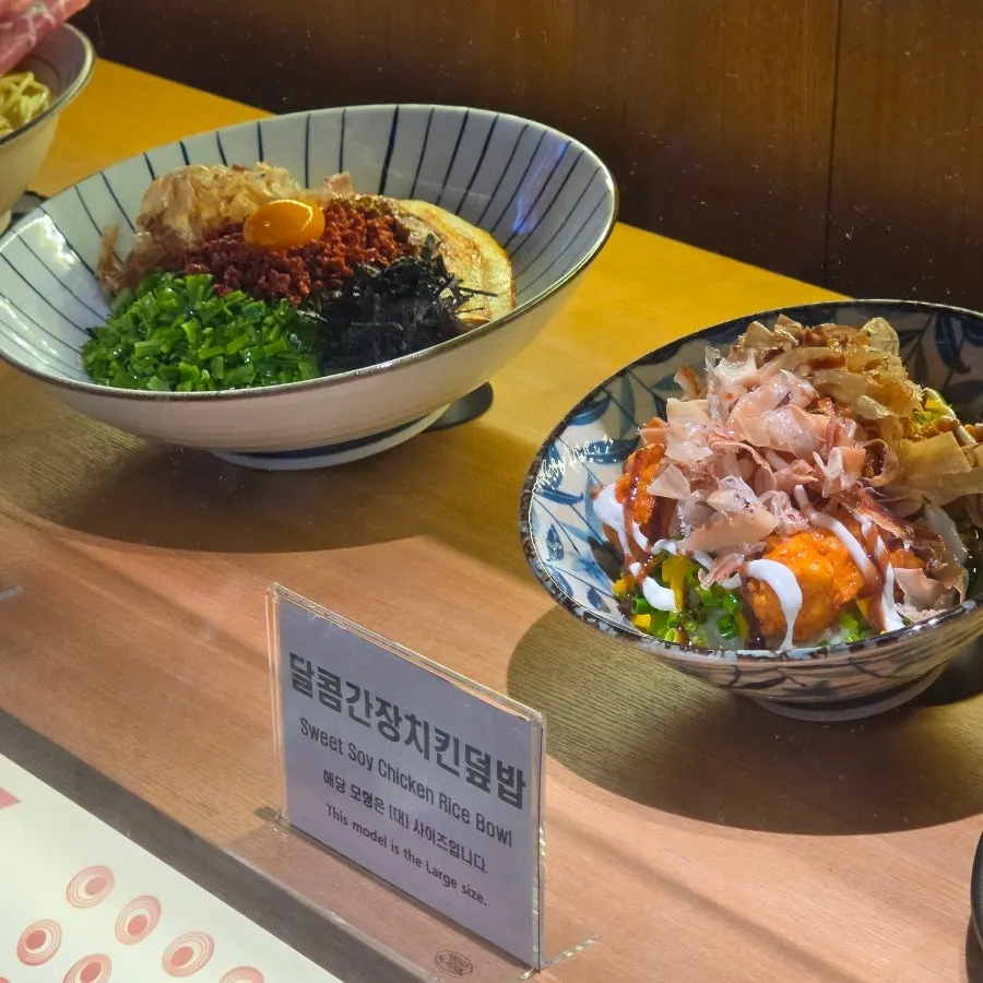 Food model display in front of Menya Seoul