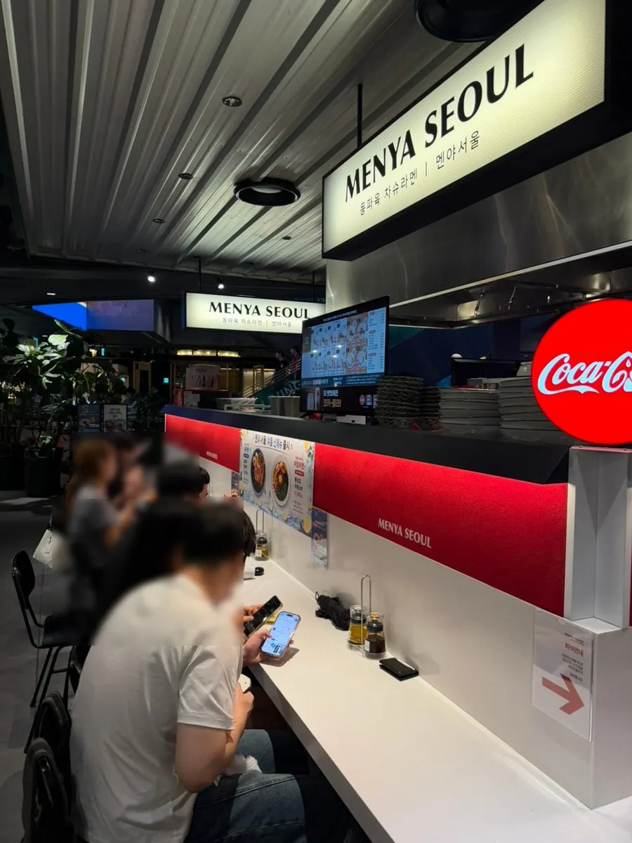Waiting area with the buzzer in hand