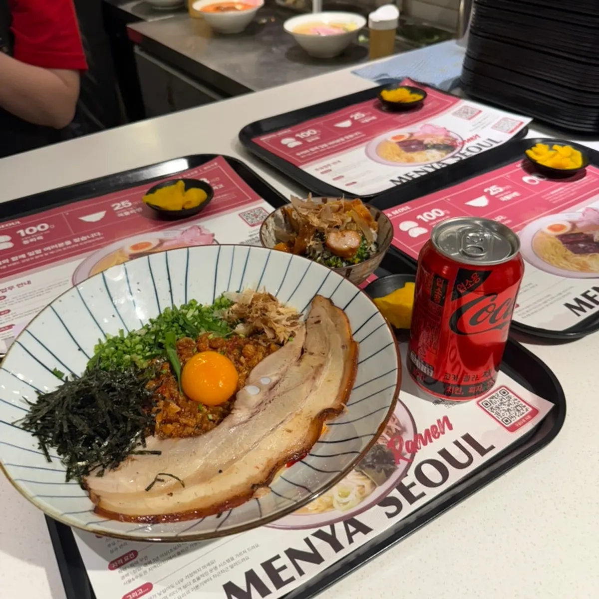 Table spread of the mazesoba and sweet soy chicken rice bowl set