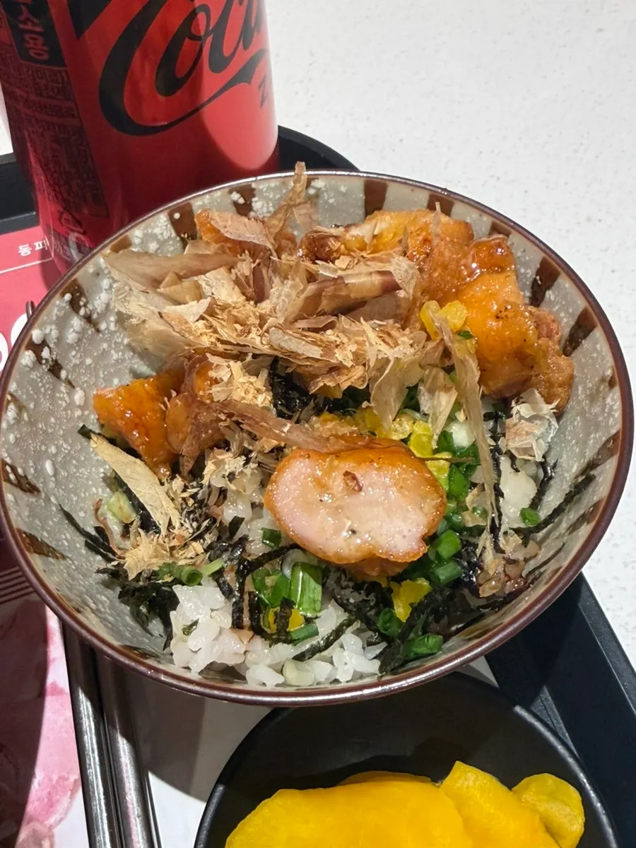 Sweet soy chicken rice bowl piled high with chicken
