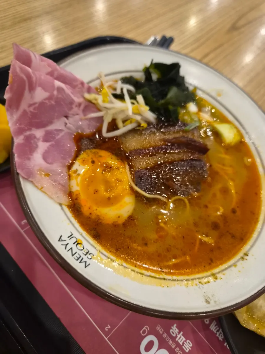 A bowl of mala broth dongpo pork ramen