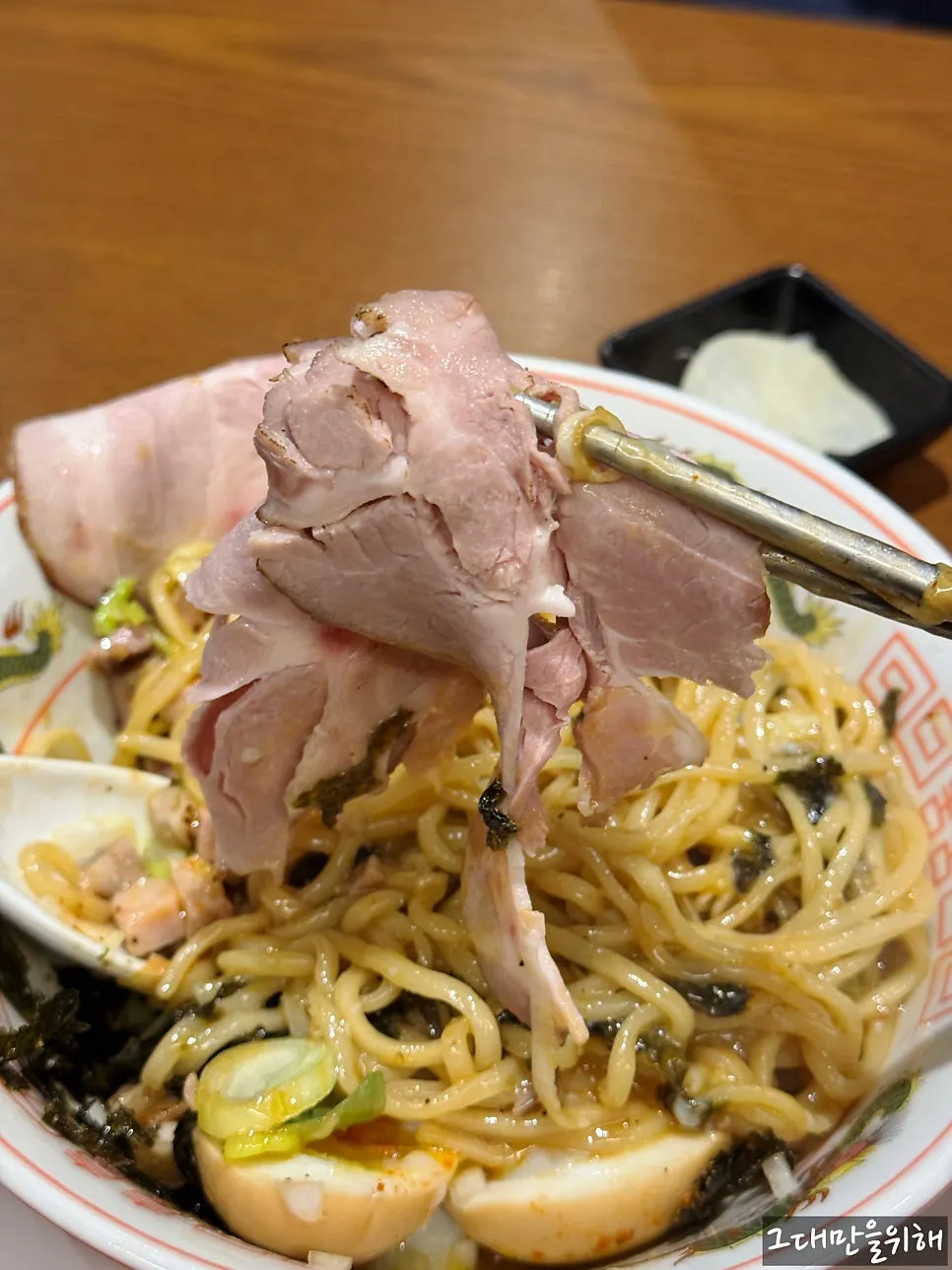 Noodles lifted from the shoyu ramen