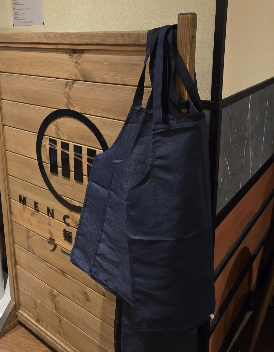 Aprons available next to the kiosk