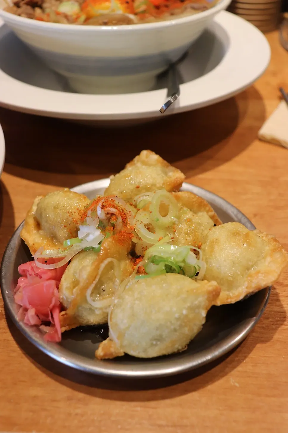 A plate of six fried gyoza from Mentsuru