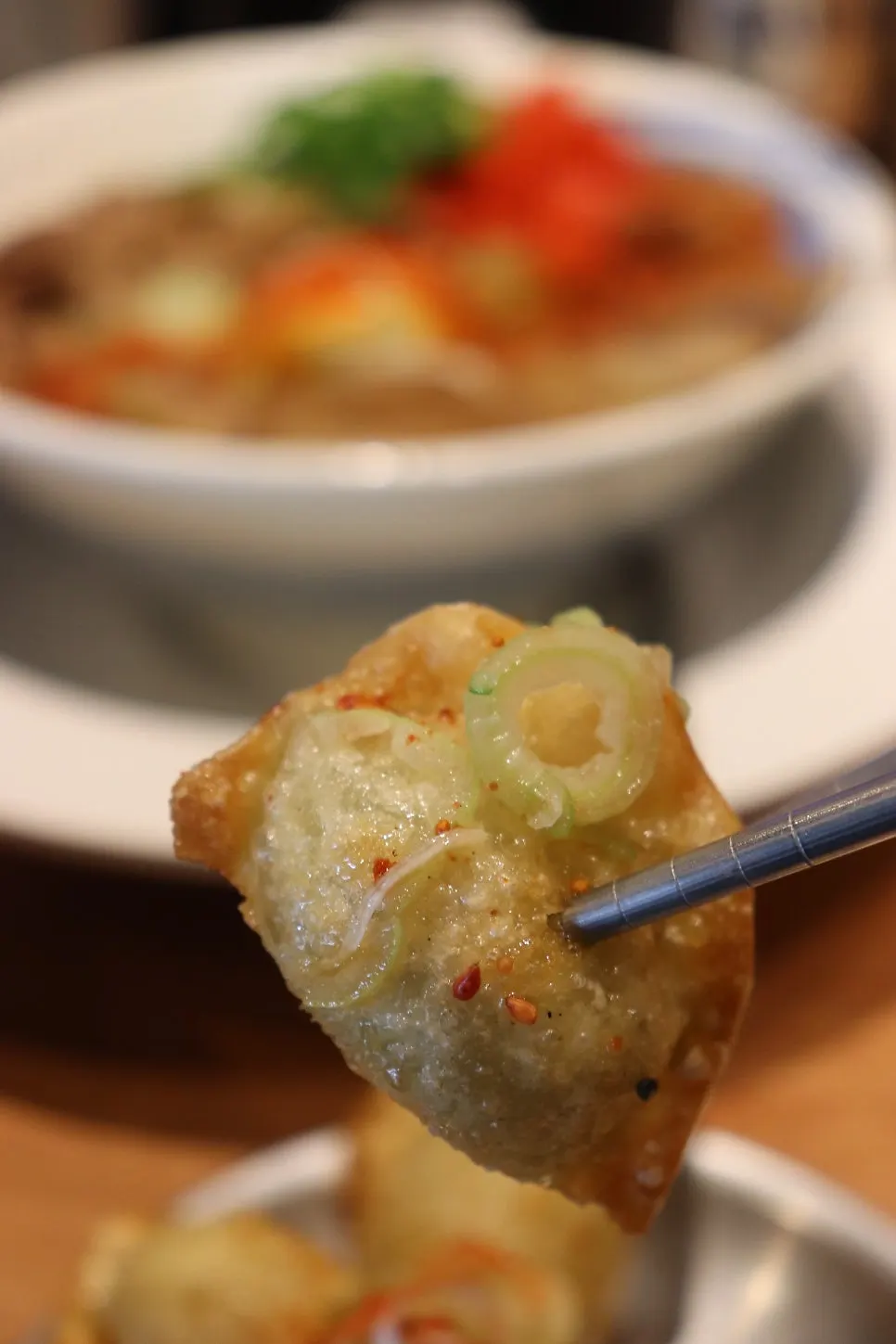 Fried gyoza seasoned with soy sauce and shichimi