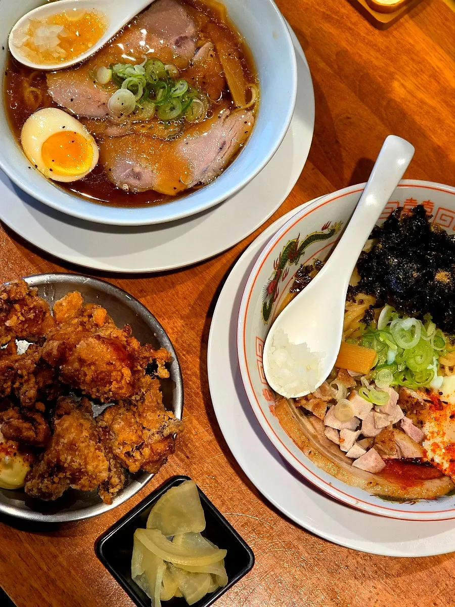 Two freshly served bowls of ramen and homemade karaage
