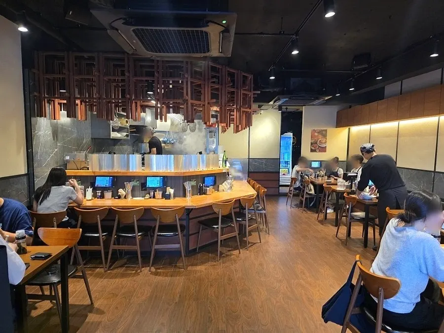 Interior of Mentsuru with a Japanese izakaya feel