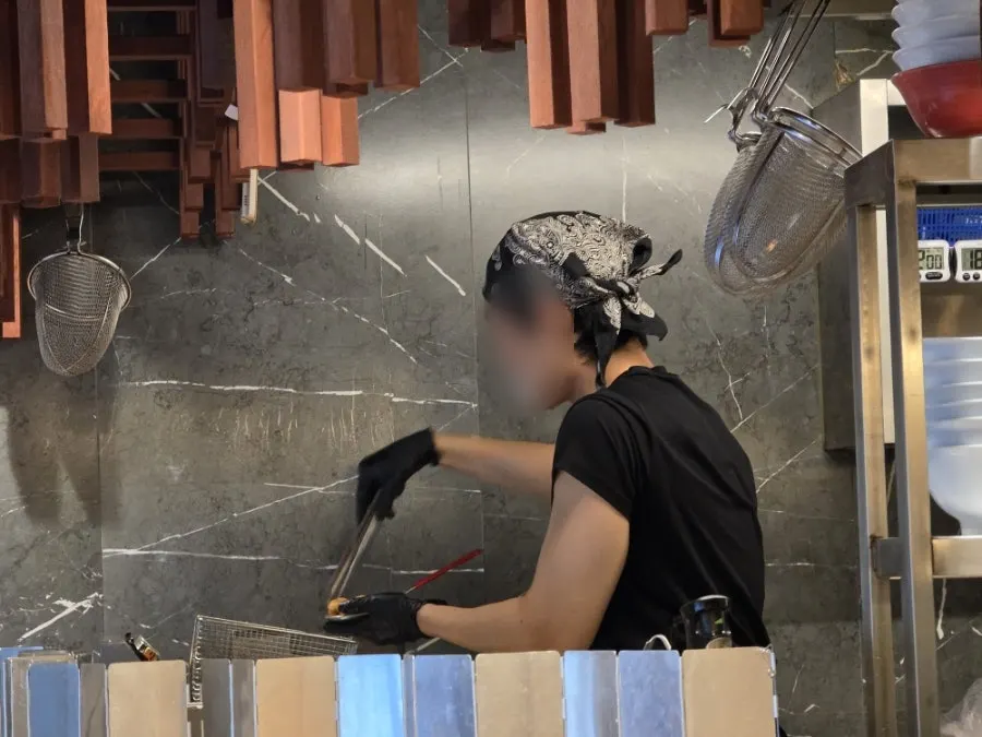Cooking in progress in the open kitchen