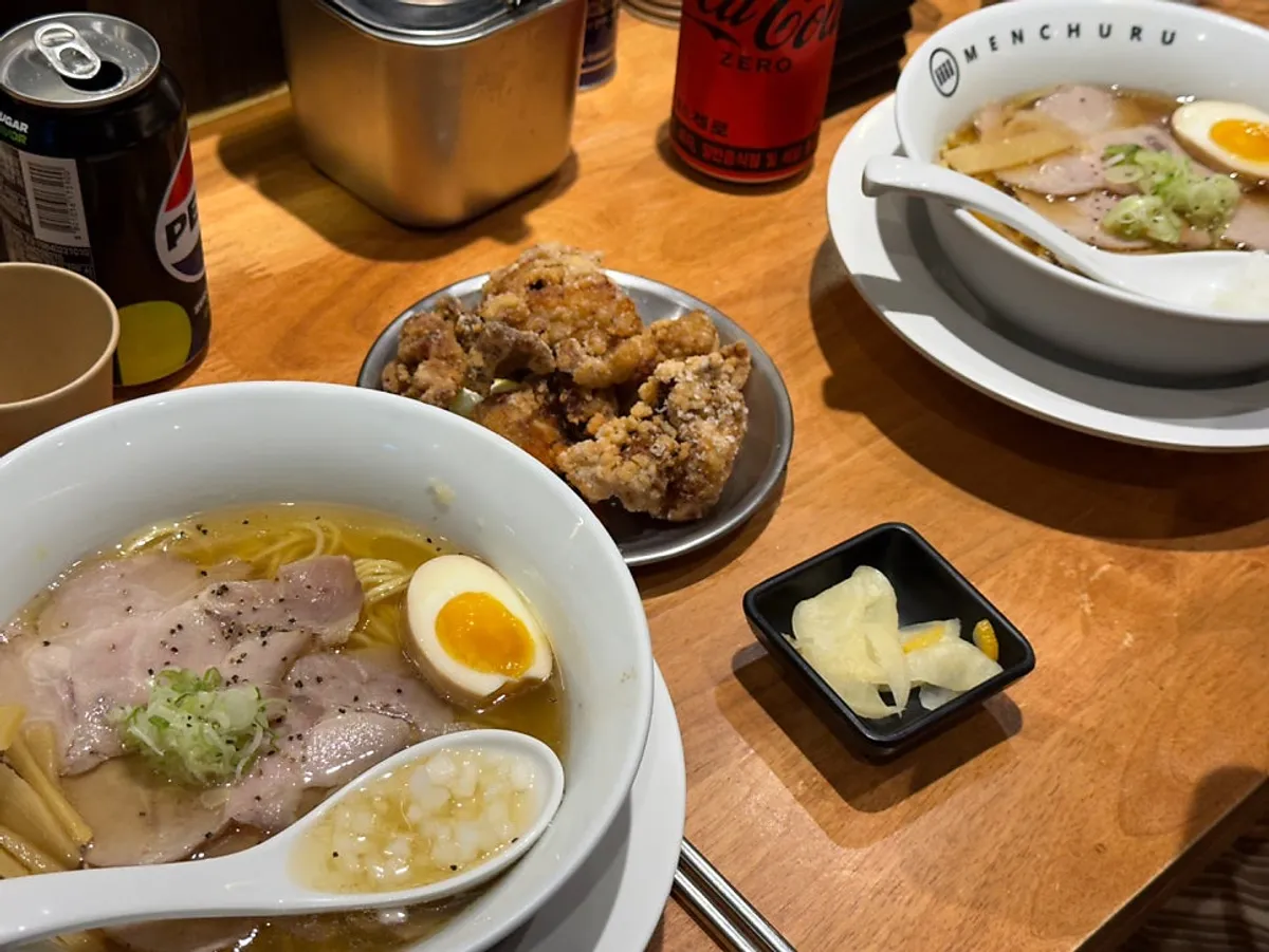 Mentsuru shoyu ramen, shio ramen, and karaage table spread