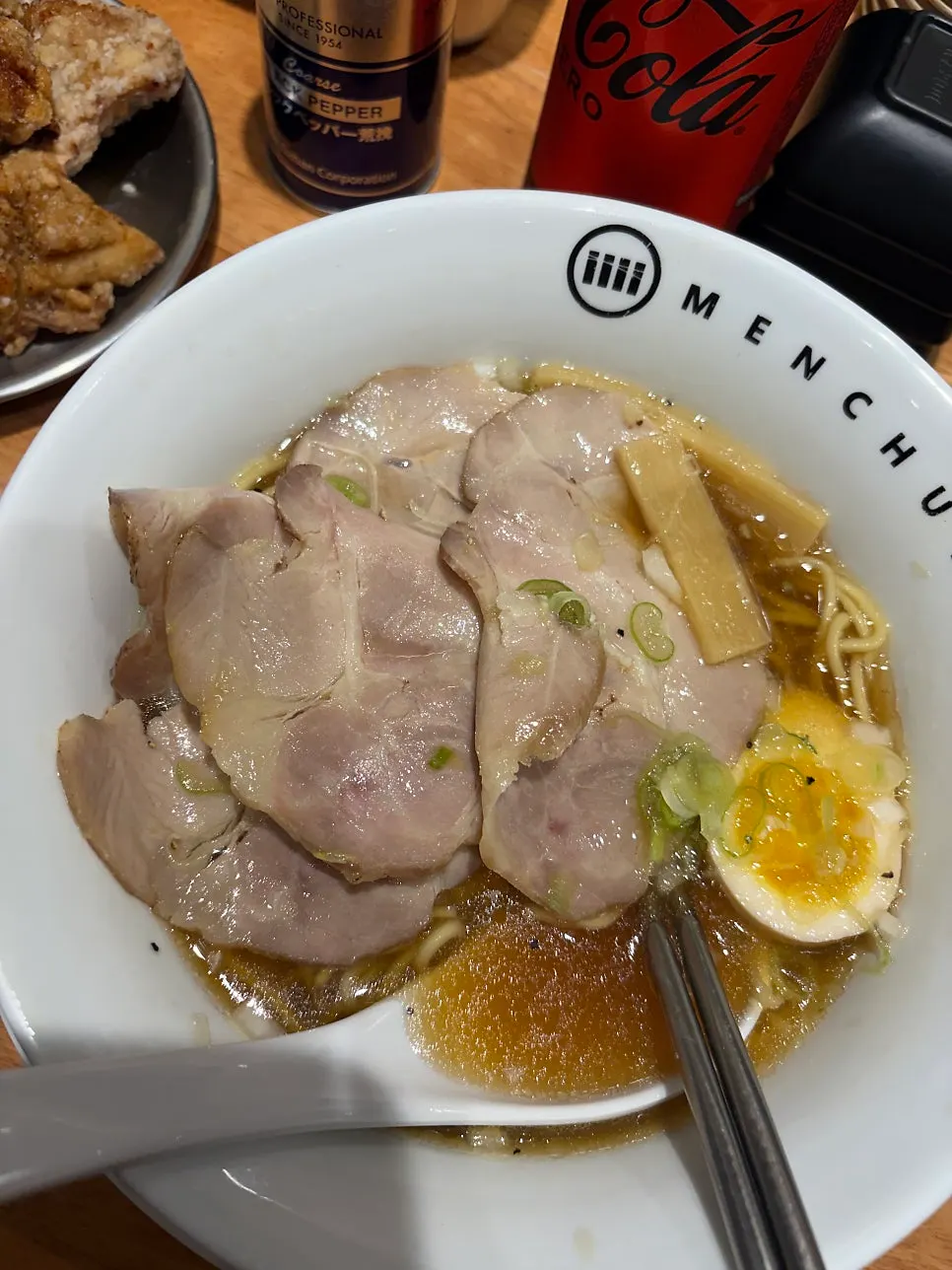 Ramen and zero-sugar cola at the bar seats