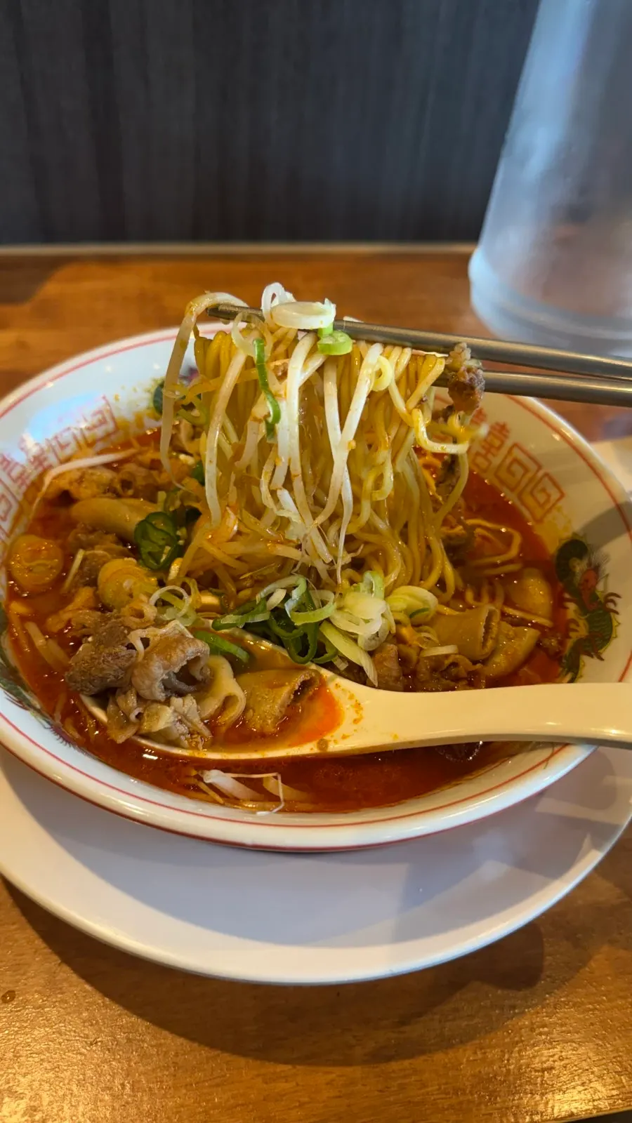 Spicy motsu ramen broth and offal pieces