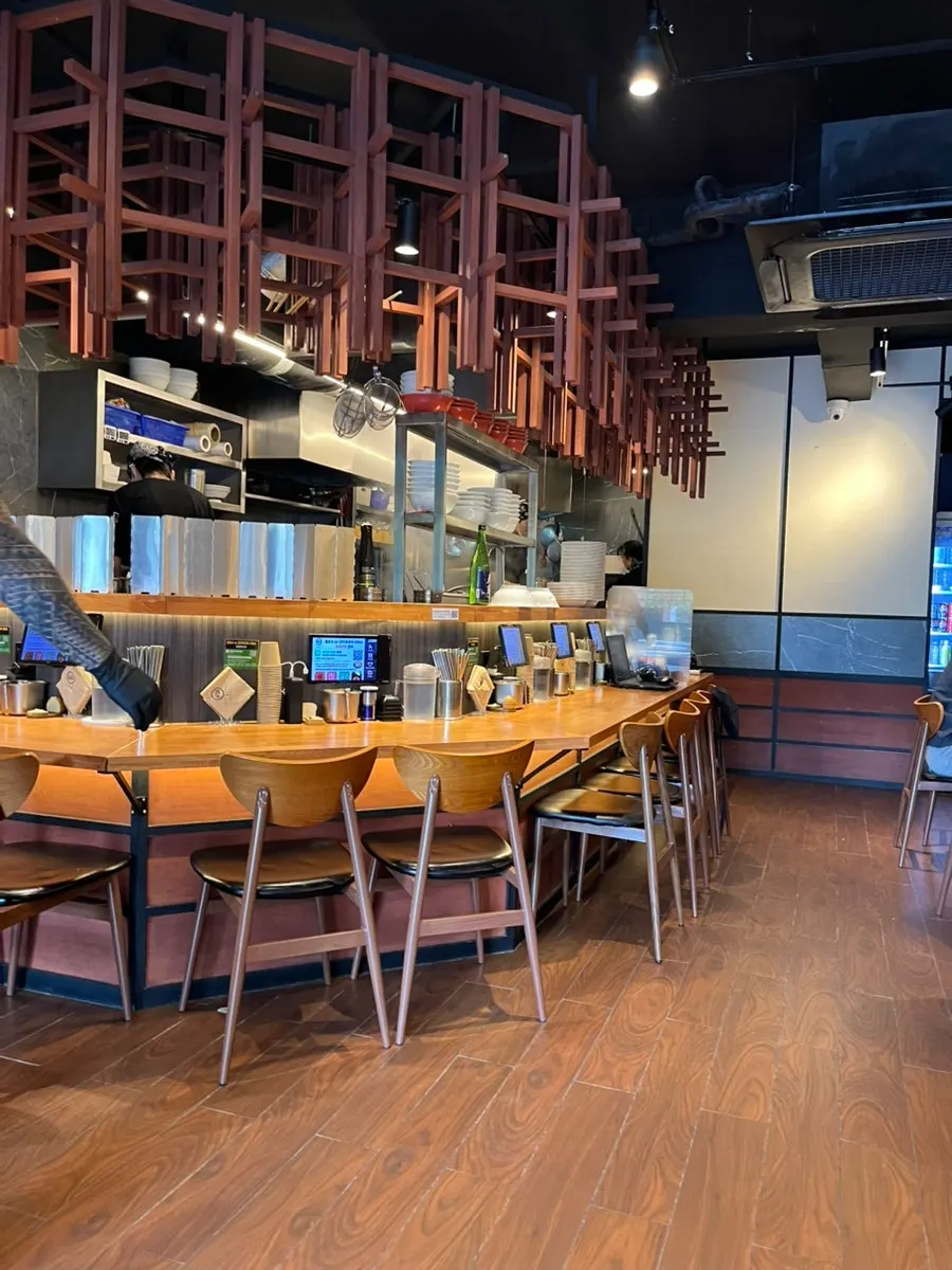 Empty table seats after the lunch rush