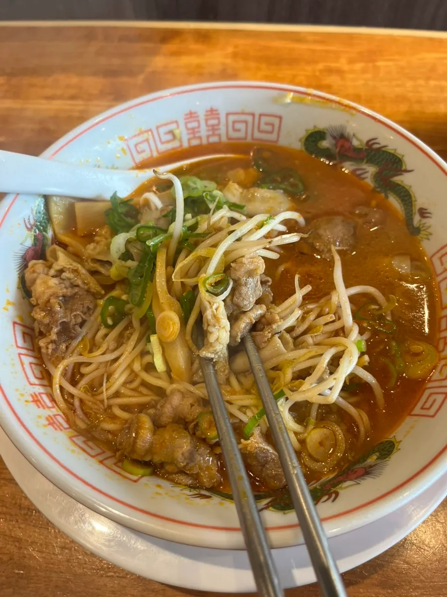 Spice level 1 motsu ramen topped with chili pepper
