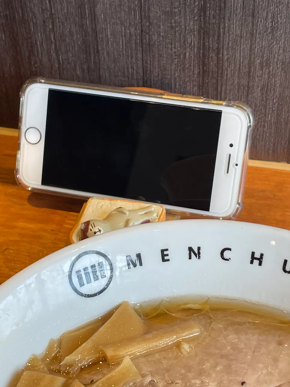 Bar seats at Mentsuru with phone stands