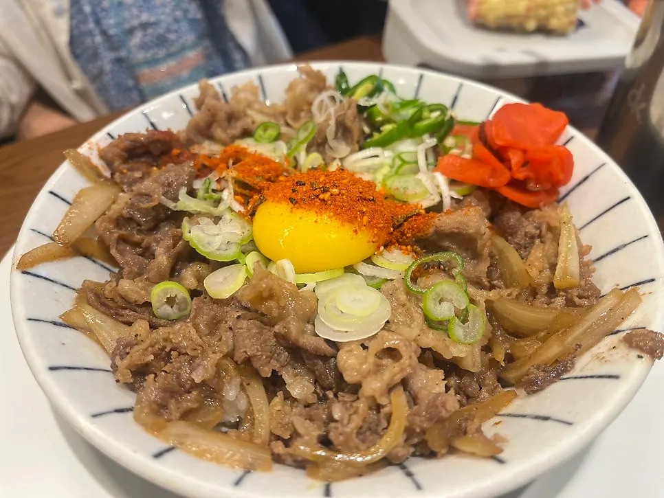 Close-up of gyudon in the special sauce