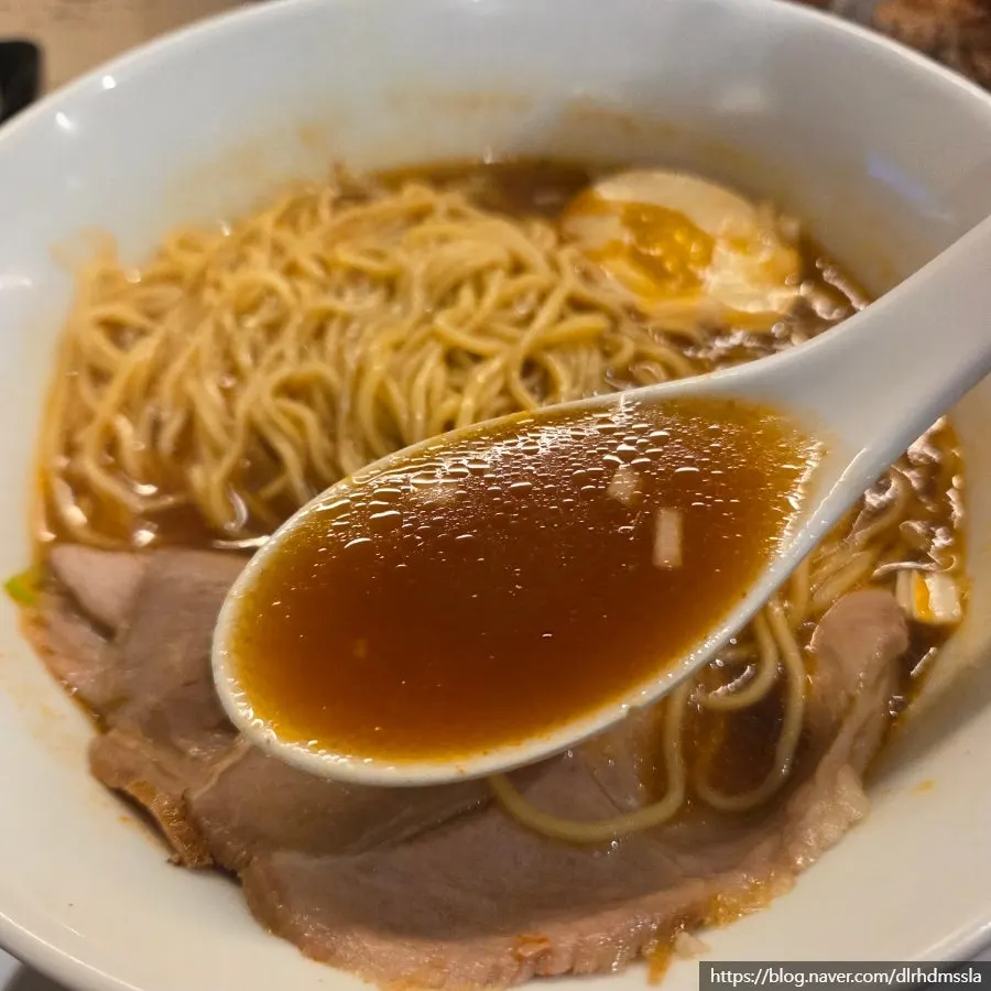 Mentsuru ramen noodles coated in soy sauce seasoning