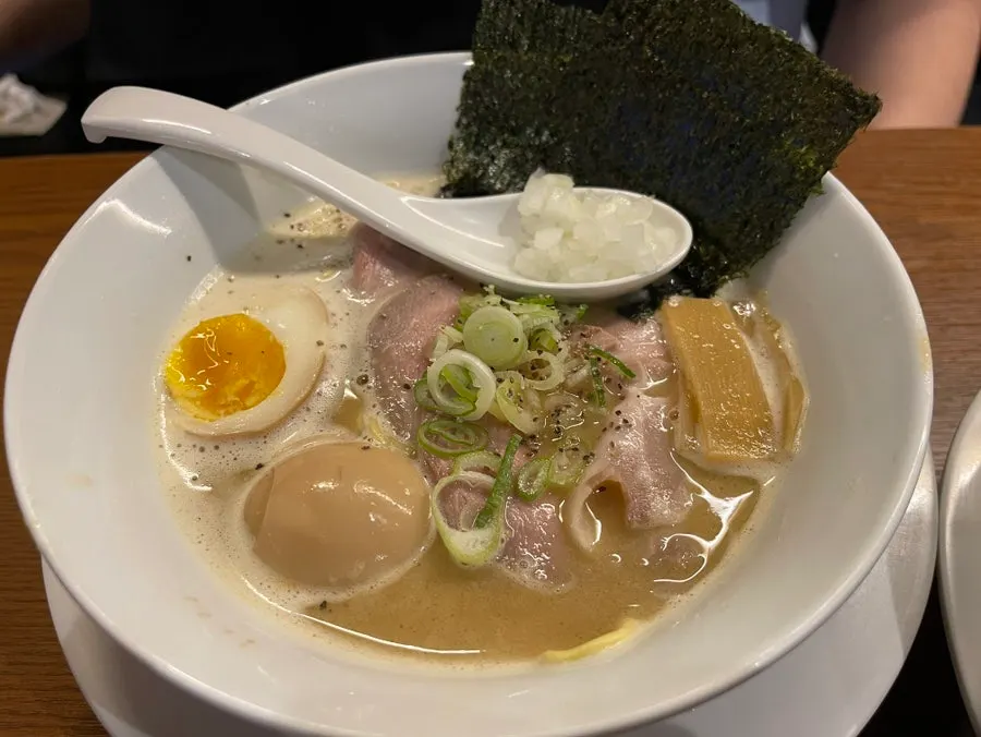 Broth and noodles of the spicy shoyu ramen