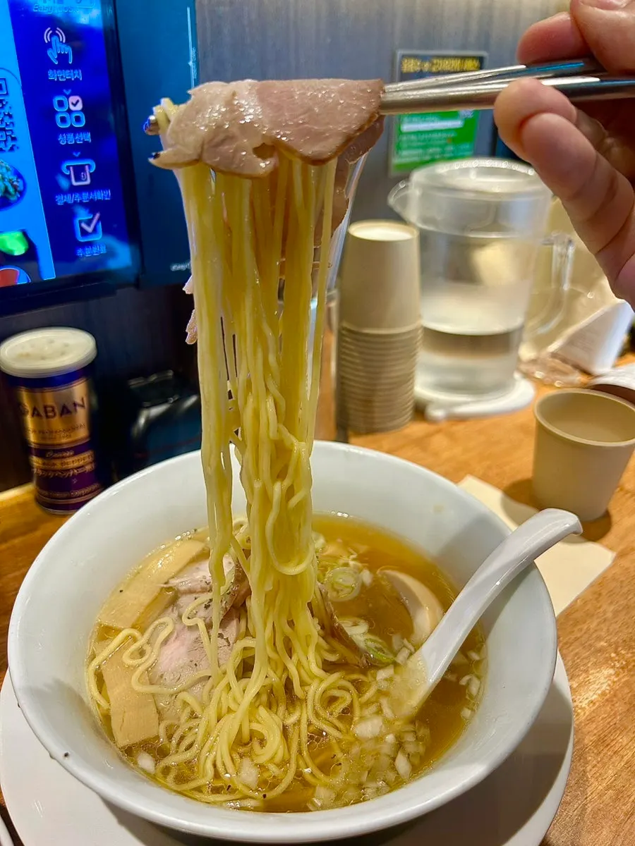 Close-up of shio ramen noodles and broth